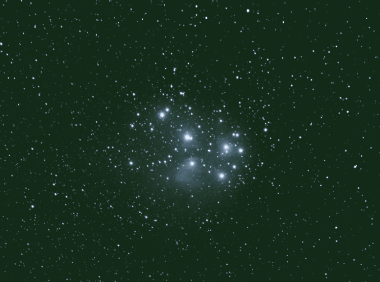 Foto van M45 de Pleiaden met mijn 200 mm canon telelens en DSLR 600D (mod)op mijn oude Polarexonders